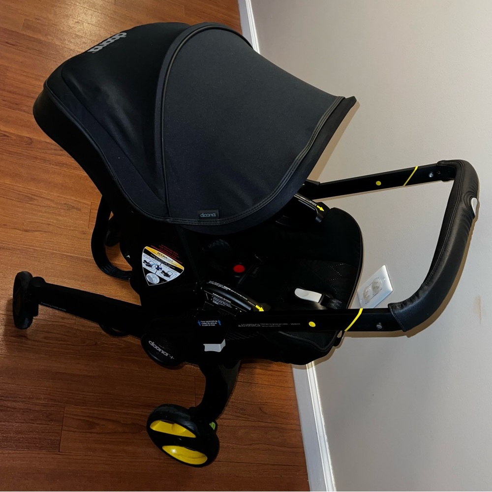 Doona Car Seat & Stroller - Midnight Edition W/FREE SkipHop seat mirror